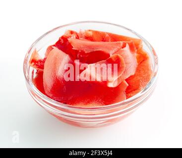 Red pickled ginger in glass bowl isolated on white background with clipping path Stock Photo