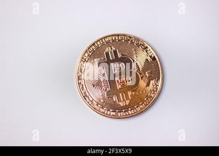 Physical bitcoin coin. Bitcoin on white background. Stock Photo