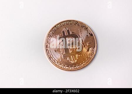 Physical bitcoin coin. Bitcoin on white background. Stock Photo