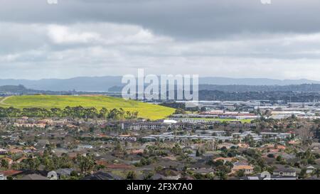 AUCKLAND, NEW ZEALAND - Apr 04, 2019: View of Dannemora houses and East Tamaki industrial estate in background Stock Photo