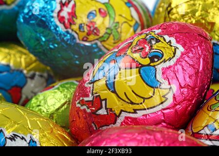 Easter party concept: close up of multicolored chocolate Easter eggs Stock Photo