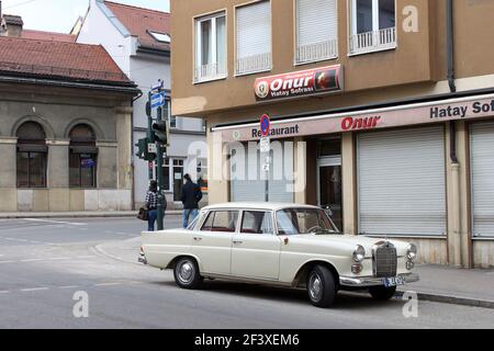 Old Mercedes car in a street in Munich, Germany Stock Photo