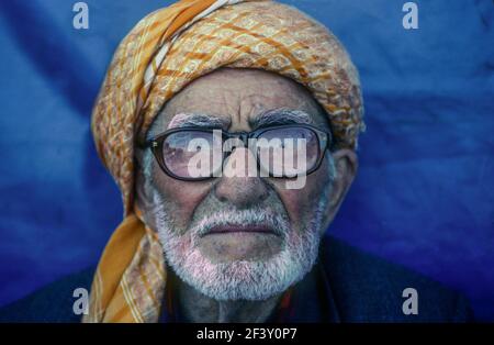 Portrait of a man with specacles and wearing a headscarf Iznic Turkey Stock Photo