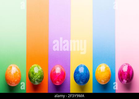 Multicolor geometric background with easter eggs. Stock Photo