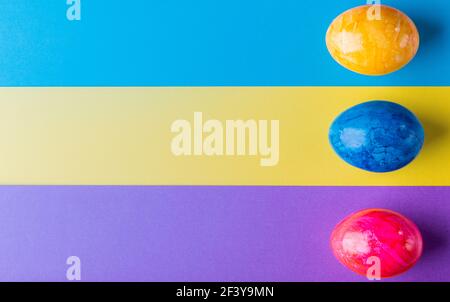 Multicolor geometric background with easter eggs. Stock Photo