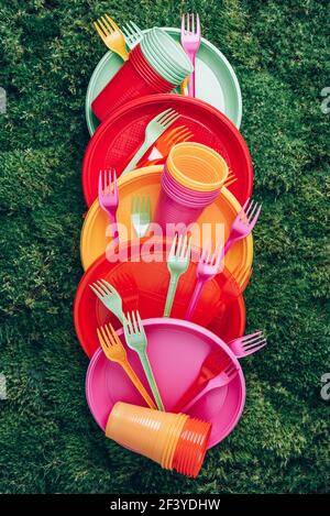 Disposable tableware, plastic utensils, plastic cups, cutlery, and other plastic  products, plastic waste, various colors, sizes and types Stock Photo - Alamy