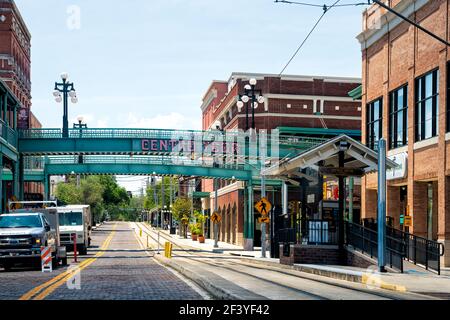 Tampa, USA - April 27, 2018: Downtown city in Florida in historic Latin American district of Centro Ybor old town with streetcar station Stock Photo