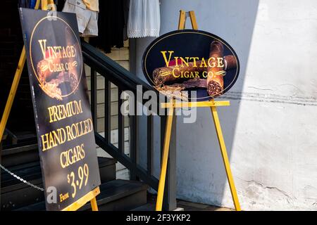 St. Augustine, USA - May 10, 2018: Vintage retro gift souvenir shop store sign selling premium hand rolled tobacco cigar products in old town Florida Stock Photo