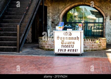 Savannah, USA - May 11, 2018: Old town River street in Georgia southern city with Savannah tours ticket office kiosk stand with nobody in summer Stock Photo