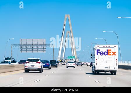 Charleston, USA - May 11, 2018: South Carolina Arthur Ravenel Jr. Cooper river cable-stayed triangular arches bridge with cars on state road 17 with t Stock Photo