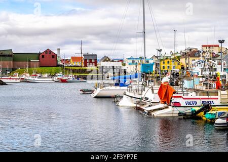 Stykkisholmur, Iceland - June 18, 2018: Town village on cloudy overcast day and cityscape skyline of small fishing village on Snaefellsnes peninsula w