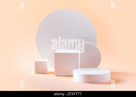 Abstract empty geometric shape podium for product on pastel beige background. Copy space. White cube on natural backdrop. Pedestal template for Stock Photo