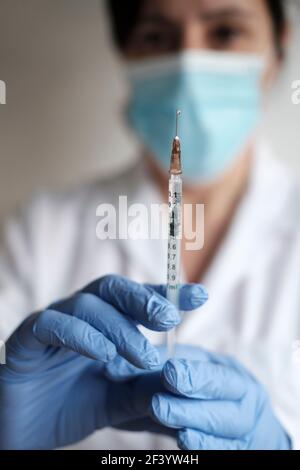 Nurse  with syringe- selective focus Stock Photo