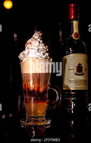 Homemade Irish Coffee with Whiskey and Whipped Cream Stock Photo