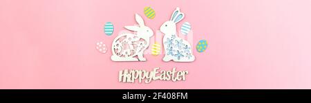 Happy Easter background with text and cute bunny with easter eggs, banner concept photo Stock Photo