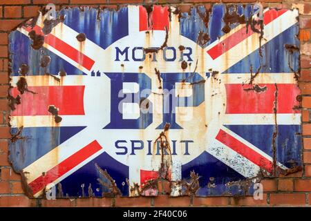 Old BP metal motor spirit union jack flag sign. Stock Photo