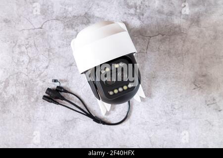 Dome CCTV secure camera or surveillance video camera on stone background before installation top view Stock Photo