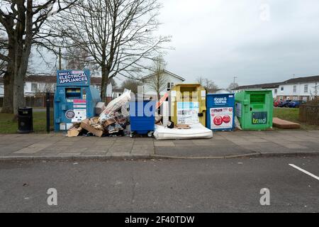 Waste disposal and overflowing rubbish bins Stock Photo