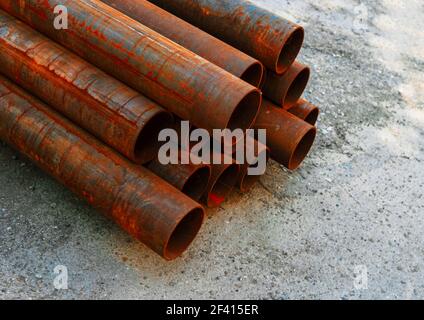 Replacement of Pipes. Set Of Water Pipes Ready For Installation Lying On Ground. Replacement of Pipes. Set Of Water Pipes Ready For Installation Stock Photo