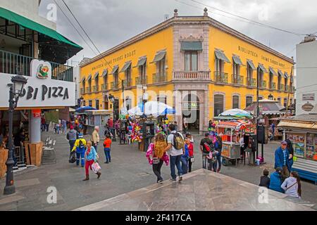 Library, restaurants and shops in the colonial city centre of Aguascalientes, north-central Mexico Stock Photo