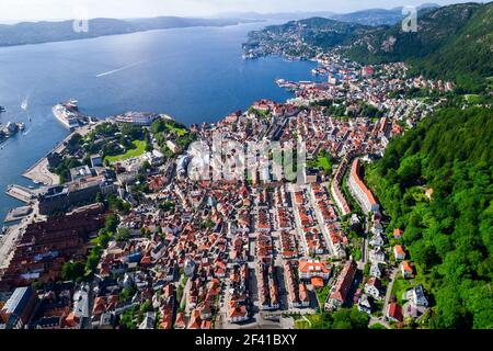 Bergen is a city and municipality in Hordaland on the west coast of Norway. Bergen is the second-largest city in Norway. The view from the height of bird flight. Aerial FPV drone flights. Stock Photo