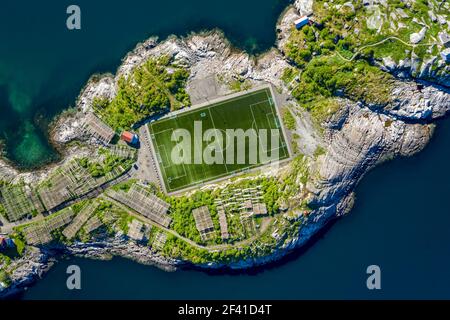 Football field stadium in Henningsvaer from above. Stock Photo