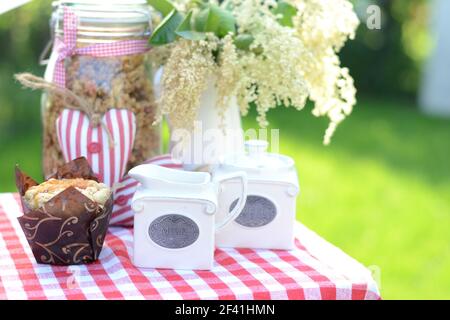 Sweet breakfast in the summer garden Stock Photo
