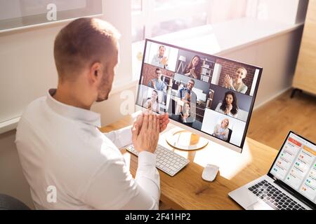 Virtual Conference Meeting Interview In Office Clapping Stock Photo