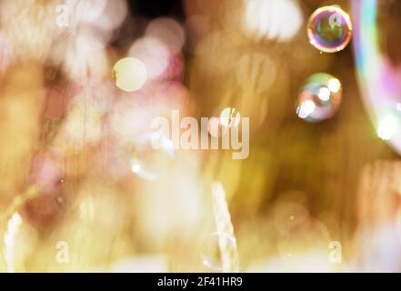 soap bubbles on a blurry green background Stock Photo