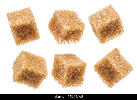 Brown sugar cubes on white background. Macro picture. Stock Photo