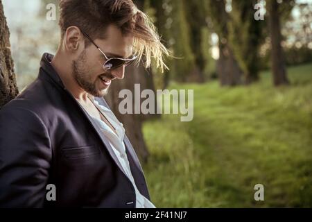 Handsome guy relaxing in the rural area Stock Photo