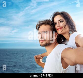 Romantic, young couple relaxing on the ferry Stock Photo