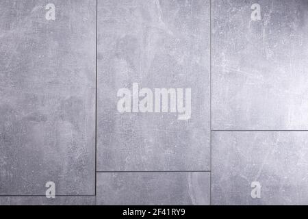 Stone or marble surface background of tile floor or wall texture.  Grey laminate background with copy space Stock Photo