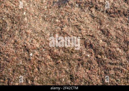 Red black white granite natural texture. Embossed surface with shadows and stone chips Stock Photo