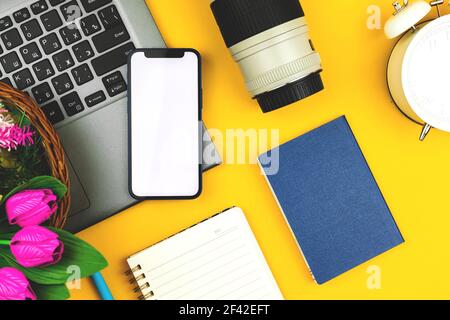 Flat lay mockup with smartphone, modern workspace and workplace concept photo Stock Photo