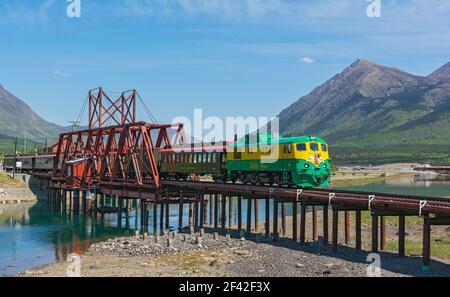 Canada, Yukon, Carcross, swing bridge across the Nares River built 1900, still used by White Pass & Yukon Route tourist train Stock Photo