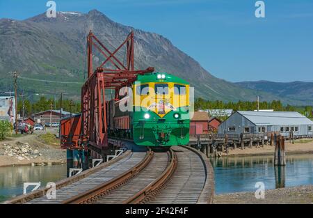 Canada, Yukon, Carcross, swing bridge across the Nares River built 1900, still used by White Pass & Yukon Route tourist train Stock Photo