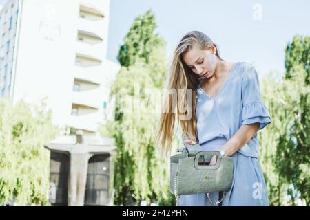 Purse handbag, bag Organizer, Keep Stuff Organized. Young woman in