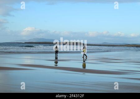 two person Reflections in the Water Stock Photo - Alamy