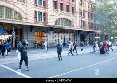 Flinders street railway station in Melbourne with commuters walking to the station,Melbourne,Australia Stock Photo