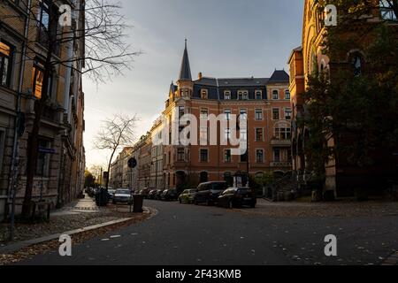Street view of old buildings in the famous Hechtviertel of Dresden Neustadt. Beautiful residential houses in sunset light with clinker facades. Stock Photo