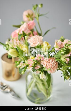 Bouquet 015. Finished flower arrangement in a vase for home. Flowers bunch, set for interior. Fresh cut flowers for decoration home. European floral Stock Photo