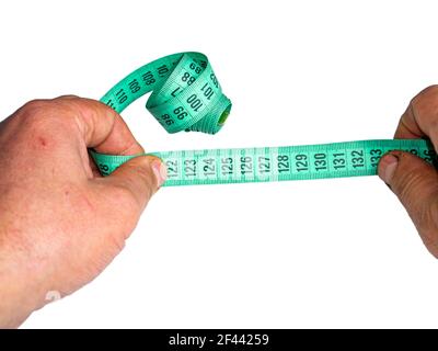 A centimeter is a tailors tool for measuring when sewing. A centimeter is a tool for measuring dimensions. A meter for sewing clothes. Tailoring for t Stock Photo