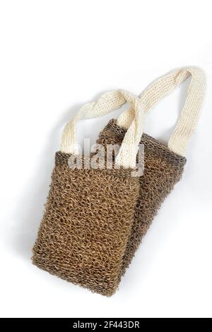 Accessories for visiting the bath or sauna: washcloth on a white background. Top view, flat position, copy space Stock Photo