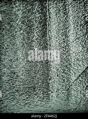 Abstract background: Metal surface with shiny green pattern Stock Photo