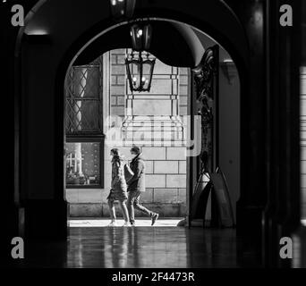 munich, germany - march 06 2020: locals and tourist walking with face mask during german lockdown to odeonsplatz. Stock Photo