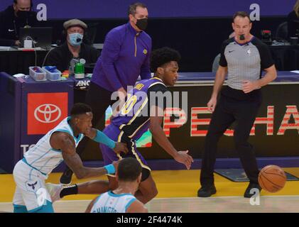 Los Angeles, United States. 18th Mar, 2021. Charlotte Hornets' guard .Terry Rozier and Los Angeles Lakers' center Damian Jones chase the loose ball during the first half at Staples Center in Los Angeles on Thursday, March 18, 2021. The Lakers defeated the Hornets 116-105. Photo by Jim Ruymen/UPI Credit: UPI/Alamy Live News Credit: UPI/Alamy Live News Stock Photo