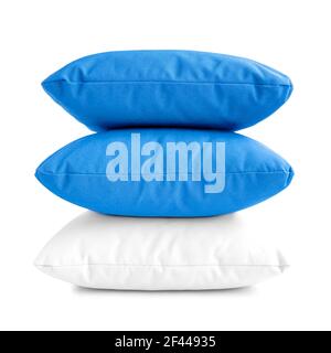 Stack of three cushions or pillows isolated on white background Stock Photo