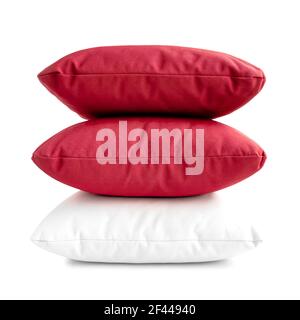 Stack of three cushions or pillows isolated on white background Stock Photo