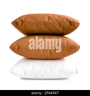 Stack of three cushions or pillows isolated on white background Stock Photo